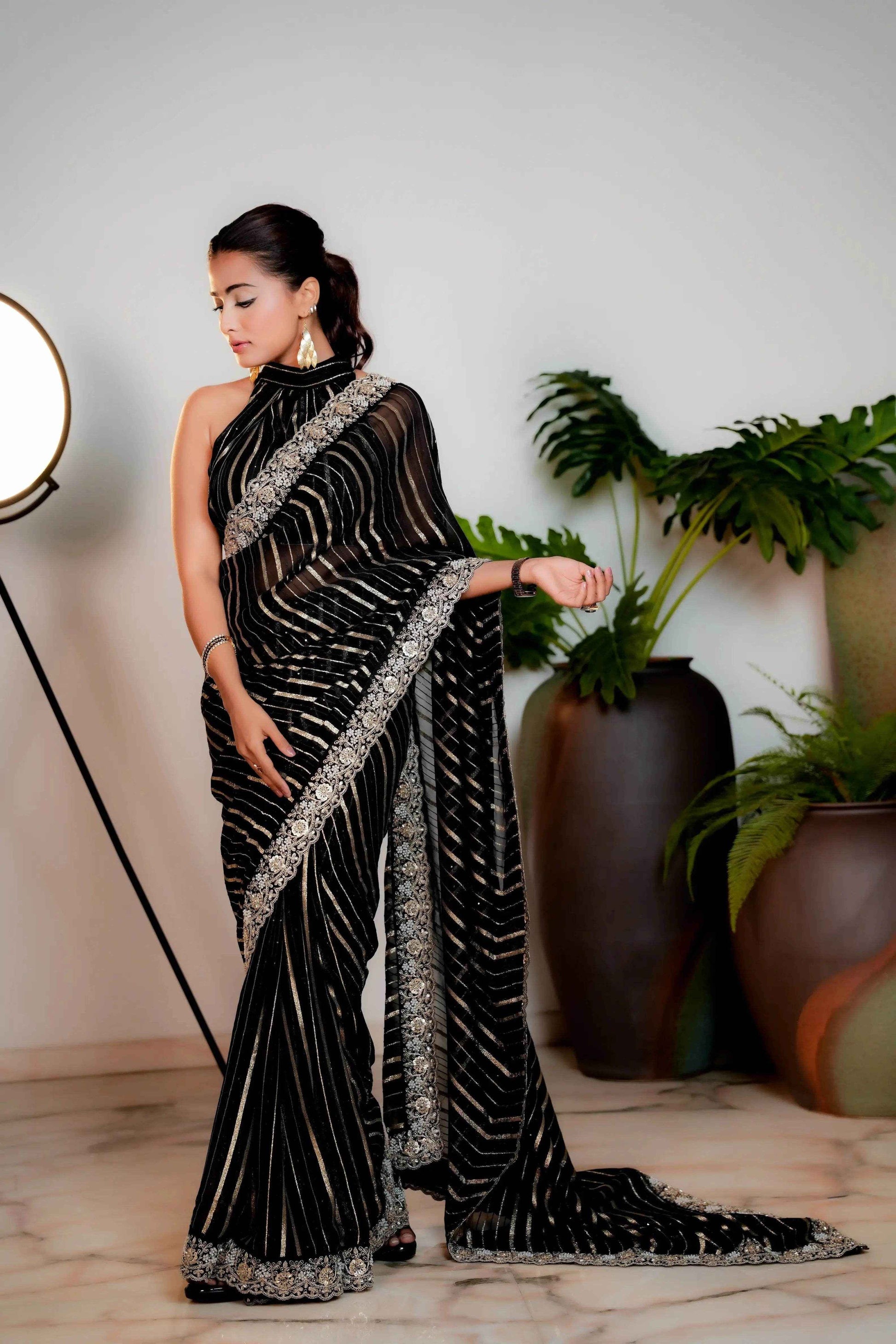 Coal Black Woven Georgette Silk Saree with Heavy Golden Embroidered Border
