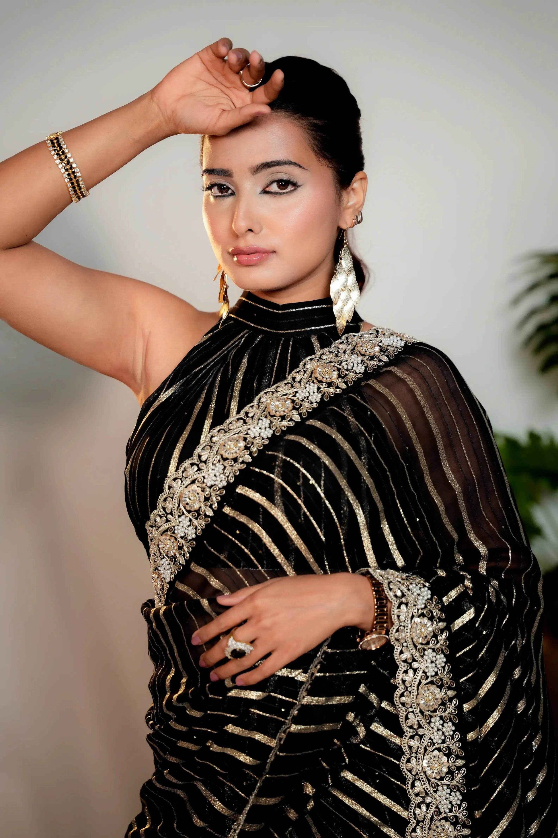 Coal Black Woven Georgette Silk Saree with Heavy Golden Embroidered Border